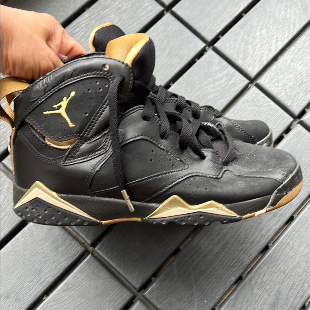 Black and Gold Air Jordan Sneakers